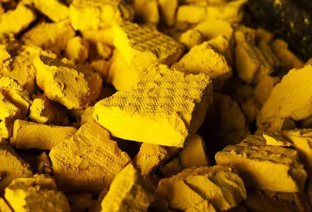 Yellow cake uranium is a solid form of uranium oxide produced from uranium ore. Yellow cake must be processed further before it is made into nuclear fuel. 