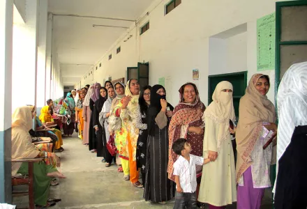 Women in Pakistan wait to vote. 