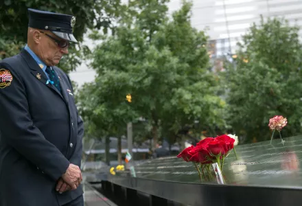 Retired New York City firefighter Joseph McCormick visits the South Pool prior to the September 11 memorial ceremony at the World Trade Center site in New York. 