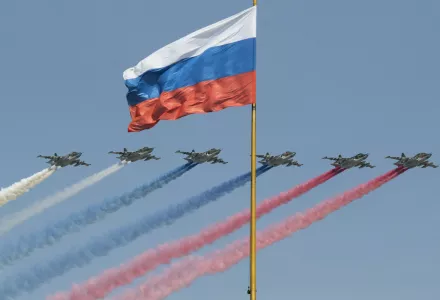 Russian Air Force Su-25 jets fly past the Russian flag on the Kremlin complex during a rehearsal for the Victory Day military parade in Moscow, Russia