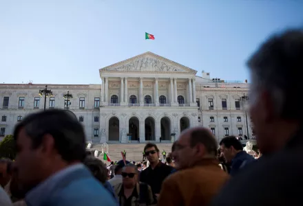 Demonstrators gather outside the Portuguese parliament at the end of a protest march in Lisbon, Saturday, April 13, 2013