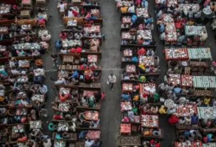 Egyptian Muslims gather for Iftar at the end of the fasting day during the holy month of Ramadan outside Hussein mosque in Cairo, Egypt.