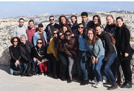 Students from the J-term Field Study Course HDS 3335: Narratives of Displacement and Belonging in Israel and the West Bank pose for a group photo.