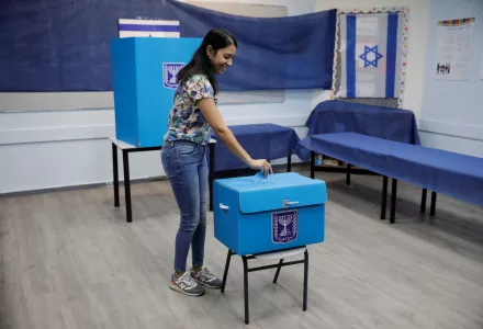 A woman votes a polling station in Rosh Haayin, Israel, Tuesday, Sept. 17, 2019.