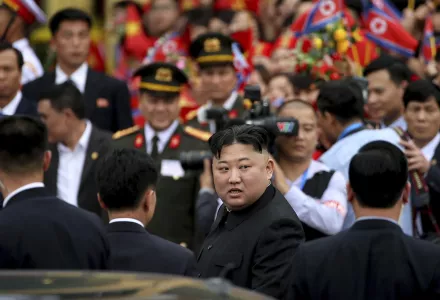North Korean leader Kim Jong Un, center, prepares to depart Dong Dang railway station in Dong Dang, Vietnamese border town Saturday, March 2, 2019. 