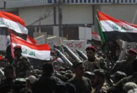 Iraqi Shiites of the Mahdi Army militia loyal to cleric Moqtada al-Sadr vow to fight ISIS in a show of strength in a military parade in the Sadr City district of Baghdad, Iraq.