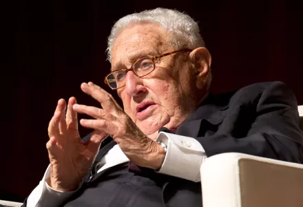Kissinger speaks during a panel discussion.