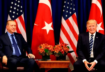 Turkey's President Recep Tayyip Erdogan, left, and US President Donald Trump pose for photographers at the start of their meeting in New York, Thursday, Sept. 21, 2017.