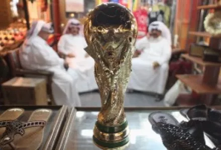 A replica of the FIFA World Cup trophy in the Souq Waqif traditional market in Doha, Qatar.