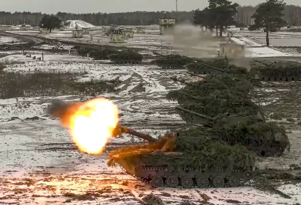 Armored vehicles fire during Belarusian and Russian joint military drills at Brestsky firing range, Belarus, February 4, 2022.