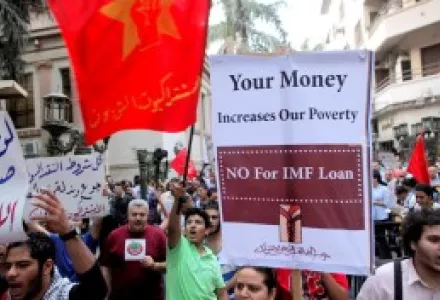 Egyptians protest against the International Monetary Fund loan in Cairo, Egypt, Wednesday, Aug. 29, 2012.