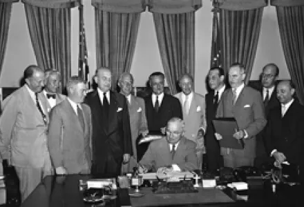 U.S. President Harry S. Truman signs a proclamation declaring into effect the 12-nation Atlantic Pact binding North America and Western Europe in a common defense alliance, Aug. 24, 1949.