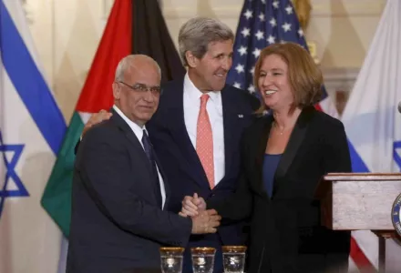 Dr. Saeb Erekat, John Kerry, and Tzipi Livni at a July 2013 press conference in Washington, DC, relaunching peace talks.