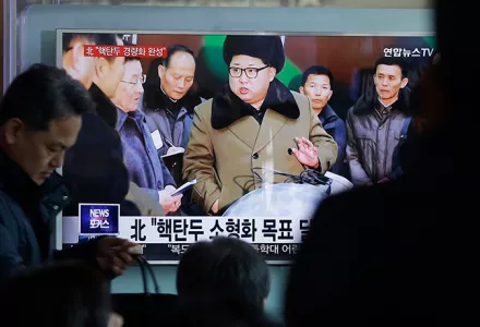 People watch a TV news program showing North Korean leader Kim Jong Un with superimposed letters that read: "North Korea has made nuclear warheads small enough to fit on ballistic missiles" at Seoul Railway Station in Seoul, South Korea, Wednesday, March 9, 2016.