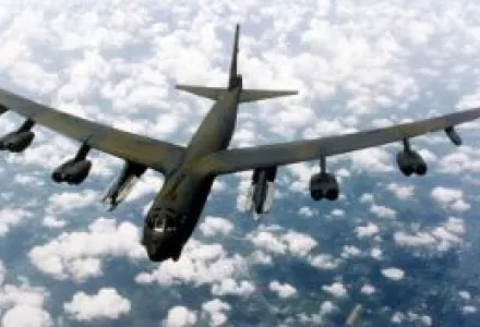 B-52 in flight FILE PHOTO -- Air Combat Command's B-52 is a long-range, heavy bomber that can perform a variety of missions.  It can carry nuclear or conventional ordnance with worldwide precision navigation capability.