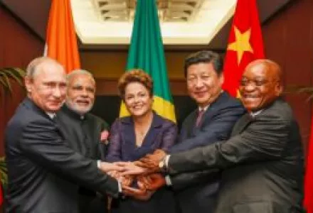 BRICS heads of state and government hold hands ahead of the 2014 G-20 summit in Brisbane, Australia, 15 November 2014.