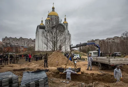 A mass grave near the Church of St. Andrew in Bucha, Ukraine, 13 April 2022. After liberation, 116 bodies were exhumed from it.
