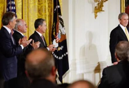President George W. Bush takes part in the Presidential Medal of Freedom ceremony for, from left, former British PM Tony Blair, former Australian PM John Howard, and Colombian President Alvaro Uribe, Jan. 13, 2009.