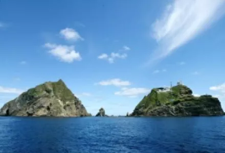 The Liancourt Rocks, known as Dokdo (or Tokto,  literally "solitary island") in Korean, as Takeshima (literally "bamboo island") in Japanese.