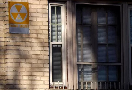 Close-up of the brick apartment building, which was outfitted with a fallout shelter in the middle of the last century, 28 February 2016.