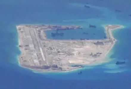 Fiery Cross Reef, Spratly Islands, South China Sea, in May 2015. Chinese dredging vessels are purportedly seen in the waters around Fiery Cross Reef.