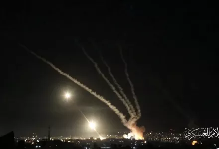 Screenshot from a Hamas video showing the launch of rockets from a populated civilian area.