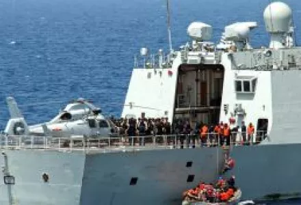 Sailors from the guided-missile destroyer USS Winston S. Churchill (DDG 81) board the Chinese People's Liberation Army (Navy) frigate Yi Yang (FF 548) to meet prior to conducting a bilateral counter-piracy exercise in the Gulf of Aden,  Sep. 17, 2012