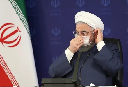 President Hassan Rouhani with a face mask, 25 July 2020. Rouhani says Iran is retaliating against U.S. sanctions.