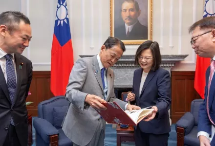 Taiwan's President Tsai Ing-wen, center right, chats with Taro Aso, vice president of Japan's ruling Liberal Democratic Party during a visit to the Presidential Office in Taipei, Taiwan, Aug. 8, 2023. The senior Japanese politician advocated for increasing his country's deterrence ability to ensure peace in the region and called for that message to be clearly conveyed globally — particularly in China.