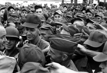 President Lyndon B. Johnson greets U.S. troops in Vietnam in 1966.