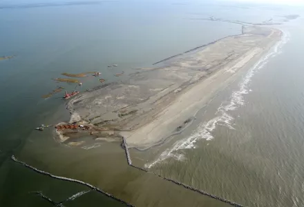 Barrier islands in the Gulf of Mexico are more than nurseries and habitats for many valuable fisheries and wildlife—they also serve as powerful shields for coastal communities from approaching hurricanes, particularly storm surges. Unfortunately, due to sea level rise, land subsidence, erosion, and other factors, 34 square miles of coastal wetlands in Louisiana alone are lost every year. 