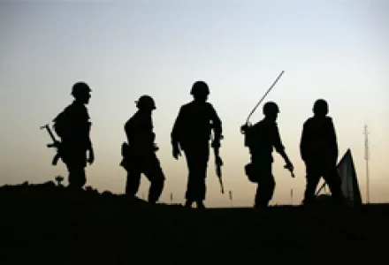 Members of Iran's Revolutionary Guards during maneuvers depicting a military operation during the Iran-Iraq War in the 1980s, near Tehran, Sep. 25, 2011. These maneuvers are part of various ceremonies marking the 31st anniversary of the war's onset.