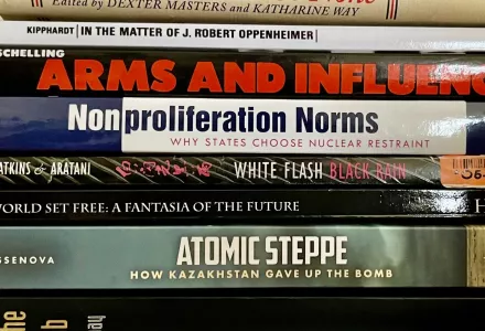 A stack of books about nuclear weapons.