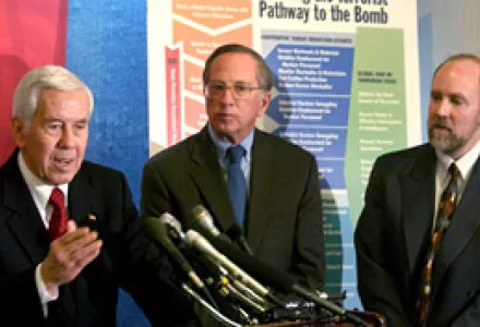 (L-R) Senate Foreign Relations Committee Chairman Sen. Richard Lugar, R-Ind., former Georgia Sen. Sam Nunn, and Matthew Bunn during a news conference at the National Press Club in Washington, March 12, 2003.