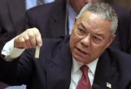 At the United Nations, U.S. Secretary of State Colin Powell holds a model vial of anthrax, while arguing that Iraq is likely to possess WMDs, February 5, 2003.