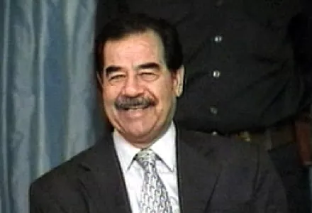 Iraq's President Saddam Hussein attends a meeting of Iraq's Revolutionary Council in Baghdad in this image broadcast by Iraqi TV, Nov.13, 2002. His regime told the Iraqi people that it would accept UN inspectors to prove to the world that Iraq had no WMD.