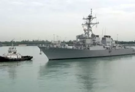 The Arleigh Burke-class guided missile destroyer USS Hopper (DDG 70) departs Changi Naval Base, Singapore, after the completion of the Singapore phase of the Cooperation Afloat Readiness and Training (CARAT) exercise, June 14, 2006.