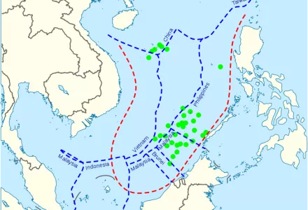 China's maritime claim (red) and UNCLOS exclusive economic zones (blue) in the South China Sea. Disputed islands (green) separate from UNCLOS.