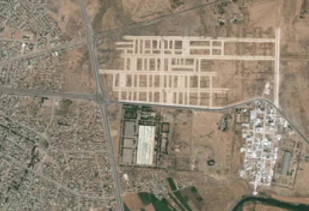 An Aug. 14, 2011, satellite image shows a facility in Al-Hasakah, Syria. IAEA investigators have asked Syria about this complex, in the image’s lower center, because they believe it closely matches uranium enrichment plant plans sold by A.Q. Khan.