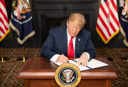President Donald J. Trump signs an EO on Iran Sanctions in the Green Room at Trump National Golf Club, August 5, 2018, in Bedminster Township, New Jersey. 