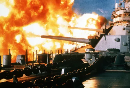 The USS New Jersey fires a salvo from its 16"/50 guns during a deployment off the coast of Beirut, Lebanon, 9 January 1984