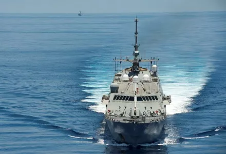 The littoral combat ship USS Fort Worth (LCS-3) conducts patrols in international waters of the South China Sea near the Spratly Islands as the People's Liberation Army-Navy [PLA(N)] guided-missile frigate Yancheng (FFG 546) transits close behind, May 11, 2015.