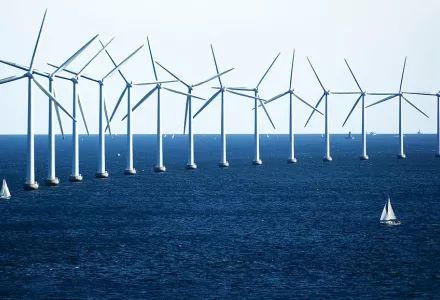 Wind Turbines and Sailboats off the coast of Kobenhavn, Denmark, 12 July 2009.