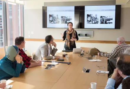 Allison Spencer Hartnett presents her research in an April 2018 MEI Seminar as MEI Faculty Chair Tarek Masoud and others look on.