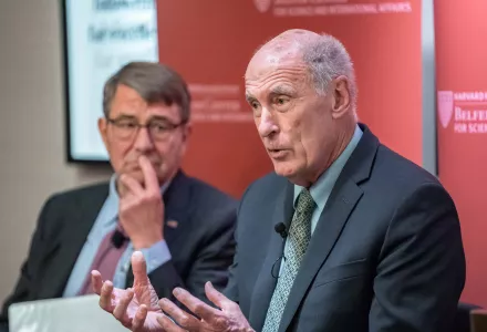 National Intelligence Director Dan Coats (right) speaks at the opening session of the Belfer Center’s annual International Council meeting. Center Director and former Secretary of Defense Ash Carter introduced Coats.