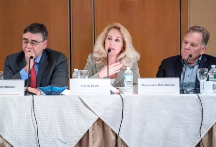 Valerie Plame, a former covert operations officer and current candidate for U.S. Congress, recalls the impact of her cover being blown in political retaliation. Former Republican Congressman Mike Rogers took part in the discussion.