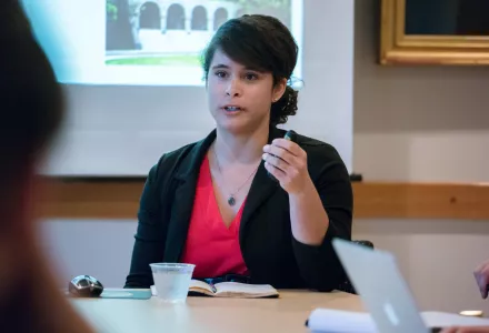 Photo of Katlyn Turner presenting her research at Harvard Kennedy School.