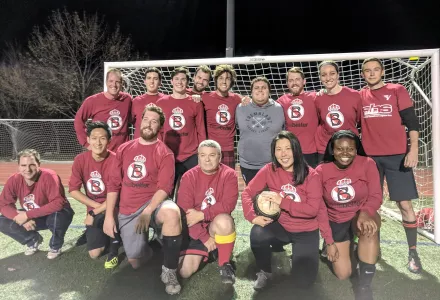 Photo of Guy Keeley with his soccer team Belfer FC.