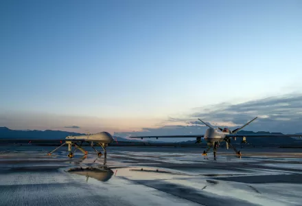 A MQ-1 Predator and a MQ-9 Reaper assigned to the 432nd Aircraft Maintenance Squadron remain ready for their next mission at Creech Air Force Base, Nevada, May 5, 2015.
