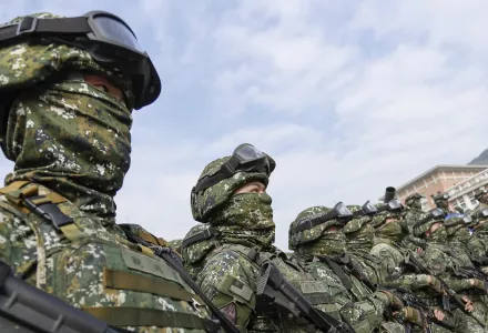 Soldiers stand guard after a preparedness enhancement drill simulating the defense against Beijing's military intrusions, ahead of the Lunar New Year in Kaohsiung City, Taiwan on Wednesday, Jan 11, 2023. China renewed its threats Wednesday to attack Taiwan and warned that foreign politicians who interact with the self-governing island are "playing with fire."